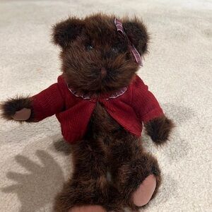 Commonwealth teddy bear with a red sweater